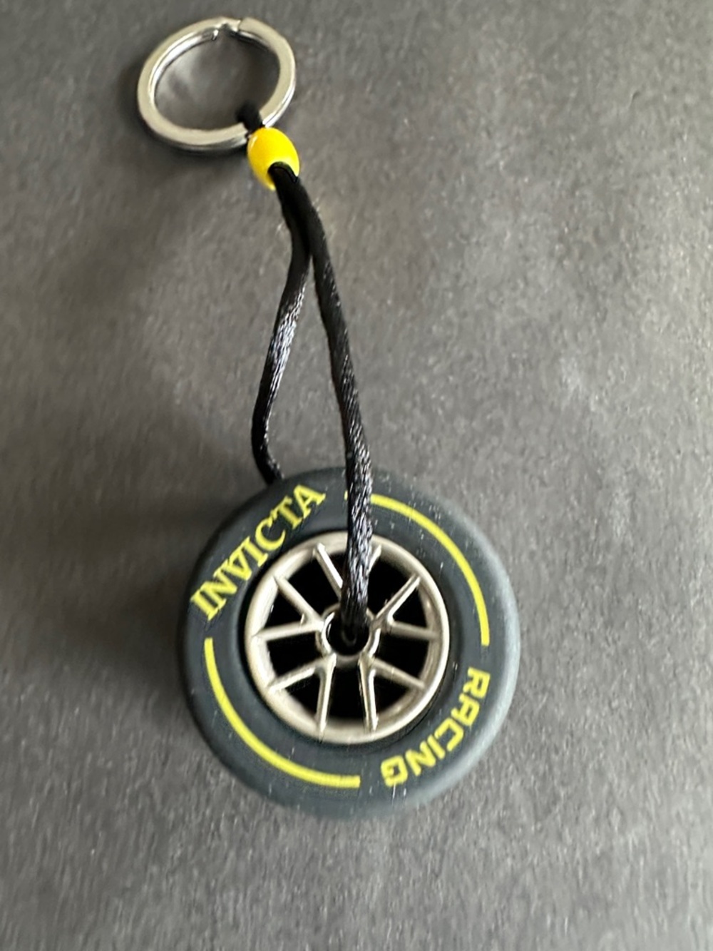 Invicta Black and Yellow Racing Tire Keychain